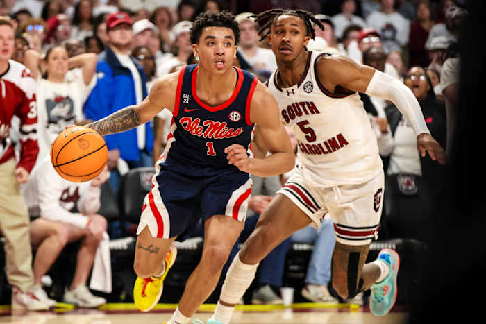 Meechie Johnson working to recover against the driving Rebel guard Austin Nunez (6th Feb., 2024)